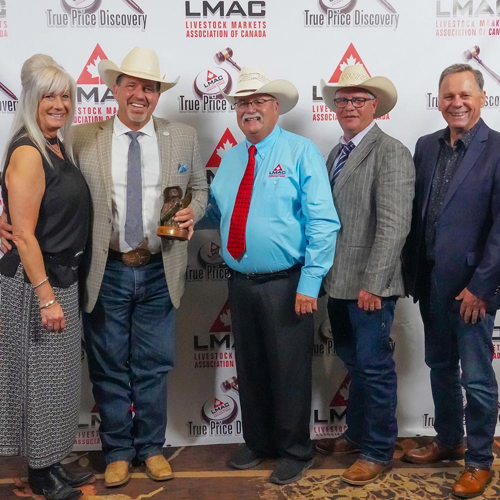 Rob Bergevin, with his wife Sharon, receiving the LMAC Industry Champion award at the 2023 LMAC convention