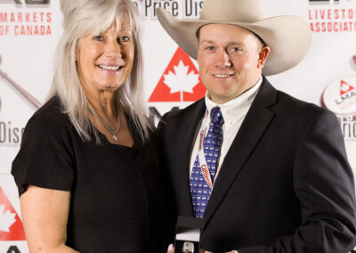 Casey Lawes was awarded the Championship custom-made ring, presented by Sharon Bergevin from Foothills Auctioneers Inc.