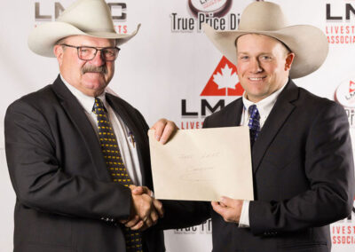 Ross Annett representing EBY Trailers, T-Down Trailer Sales and Kaldeck Trailers presents Casey Lawes with the use of a new EBY stock trailer for one year.