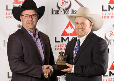 Casey Lawes was also the winner of the limited-edition Bronze Auctioneer statue presented by Michael Latimer, the General Manager of the Canadian Hereford Association.