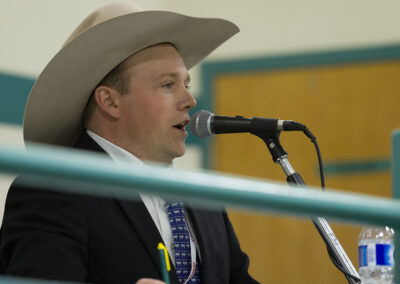 Casey Lawes participating in the 2025 Canadian Livestock Auctioneering Championship
