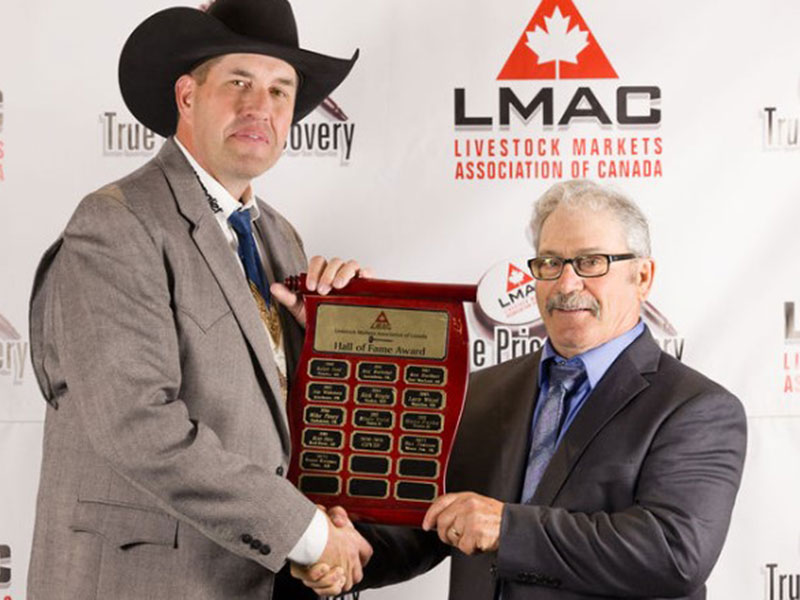 Jim Abel receives the 2025 Hall of Fame Award from Craig Jacklin Jim Abel receives the 2025 Hall of Fame Award from Craig Jacklin