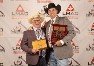 Past President, Craig Jacklin, presents Brock Taylor with the 2026 Hall of Fame Award